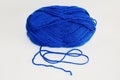 Ball of blue yarn, on white background. Royalty Free Stock Photo