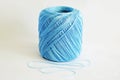 Ball of blue yarn, on white background. Royalty Free Stock Photo