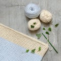 Ball of cream and blue yarn with crochet hook Royalty Free Stock Photo