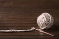 Ball of cream yarn with crochet hook Royalty Free Stock Photo