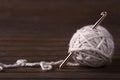 Ball of cream yarn with crochet hook Royalty Free Stock Photo