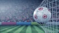 Ball with Eintracht Frankfurt football club logo hits football goal net. Conceptual editorial 3D rendering