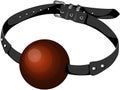 Ball gag on leather belt, isolated