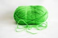 Ball of green yarn, on white background. Royalty Free Stock Photo