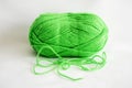Ball of green yarn, on white background. Royalty Free Stock Photo