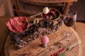 A ball of ice cream from beets and meat in an old ice-cream bowl on the background of steaks seasoned beef on vintage scales