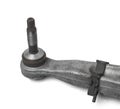 Ball joint on the arm of the car, part of the front suspension of the vehicle for repair and replacement in a vehicle repair shop