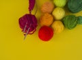 Ball for knit rainbow color a yellow background. Royalty Free Stock Photo