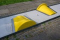 Ball on the mini golf course with yellow obstacles Royalty Free Stock Photo