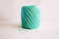 Ball of mint green yarn, on white background. Royalty Free Stock Photo