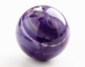 ball from natural charoite mineral on white Royalty Free Stock Photo