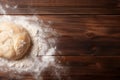 Ball of pizza dough and flour on wooden kitchen table, top view Royalty Free Stock Photo