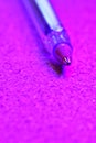 ball point pen closeup background kork paper purple light