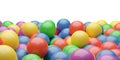 Ball pool or pit filled with red, green, yellow, pink and blue plastic balls, abstract texture border background Royalty Free Stock Photo