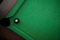 Ball at pool pocket in table corner Royalty Free Stock Photo