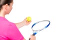 Ball and racket in the hands of women, the view from behind Royalty Free Stock Photo