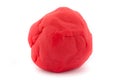Ball of red play dough on white Royalty Free Stock Photo