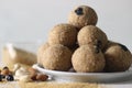 Ball shaped Indian sweet made with a mixture of foxtail millet flour, sugar, and shortening. Locally known as Nachni Ladoo