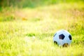 A ball for street soccer football under the sunset ray light Royalty Free Stock Photo
