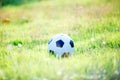 A ball for street soccer football under the sunset ray light Royalty Free Stock Photo