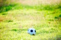 A ball for street soccer football under the sunset ray light Royalty Free Stock Photo