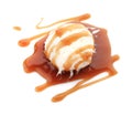 Ball of tasty vanilla ice cream with caramel topping Royalty Free Stock Photo