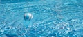 Ball To play in the pool in clear blue water Royalty Free Stock Photo