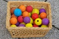 Ball toy for dogs basket wicker Royalty Free Stock Photo