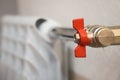 The ball valve on the water pipeline to the heating radiator Royalty Free Stock Photo