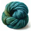 Ball of Variegated Teal and Green Wool Yarn on White Background Royalty Free Stock Photo