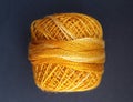 Ball of woll. Beautiful golden color. Ready for knitting or scrotching! Royalty Free Stock Photo