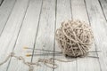 Ball of wool with spokes for handmade knitting on wooden table. Knitting wool and knitting needles. Royalty Free Stock Photo