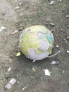 a ball that is worn out and has had most of its skin peeled off, is very historic in the course of football Royalty Free Stock Photo