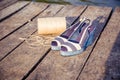 A ball of yarn around women sandals, shoes outdoors