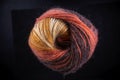 A ball of yarn with a brown and orange color Royalty Free Stock Photo