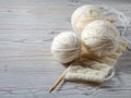 Ball of yarn and knitting on a table Royalty Free Stock Photo