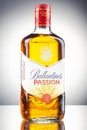 Ballantines passion spirit drink on gradient background.