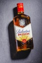 Ballantines passion spirit drink on stone slate background. Royalty Free Stock Photo