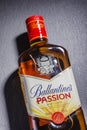 Ballantines passion spirit drink on stone slate background. Royalty Free Stock Photo