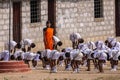 Teacher at Gymnastics at local primary school , Sanapur, Karnataka, India