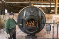 A Furnace Operator in a Recreated Miners Town in Australia