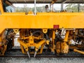 The ballast tamping machine is working to maintain the sleeper and ballast stone Royalty Free Stock Photo