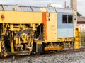 The ballast tamping machine is working to maintain the sleeper and ballast stone