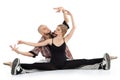 Ballerina and bald breakdancer sit on floor Royalty Free Stock Photo
