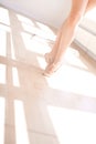 Ballerina in Ballet Slippers on Toes in Studio Royalty Free Stock Photo