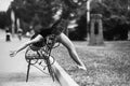 Ballerina bends back through the bench Royalty Free Stock Photo