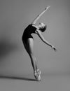 Ballerina in a black swimsuit Royalty Free Stock Photo