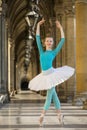 Young dancer with tutu and turqoise trikot