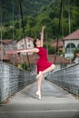 Ballerina dancing on the bridge Royalty Free Stock Photo