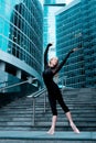 Ballerina dancing on the city street Royalty Free Stock Photo